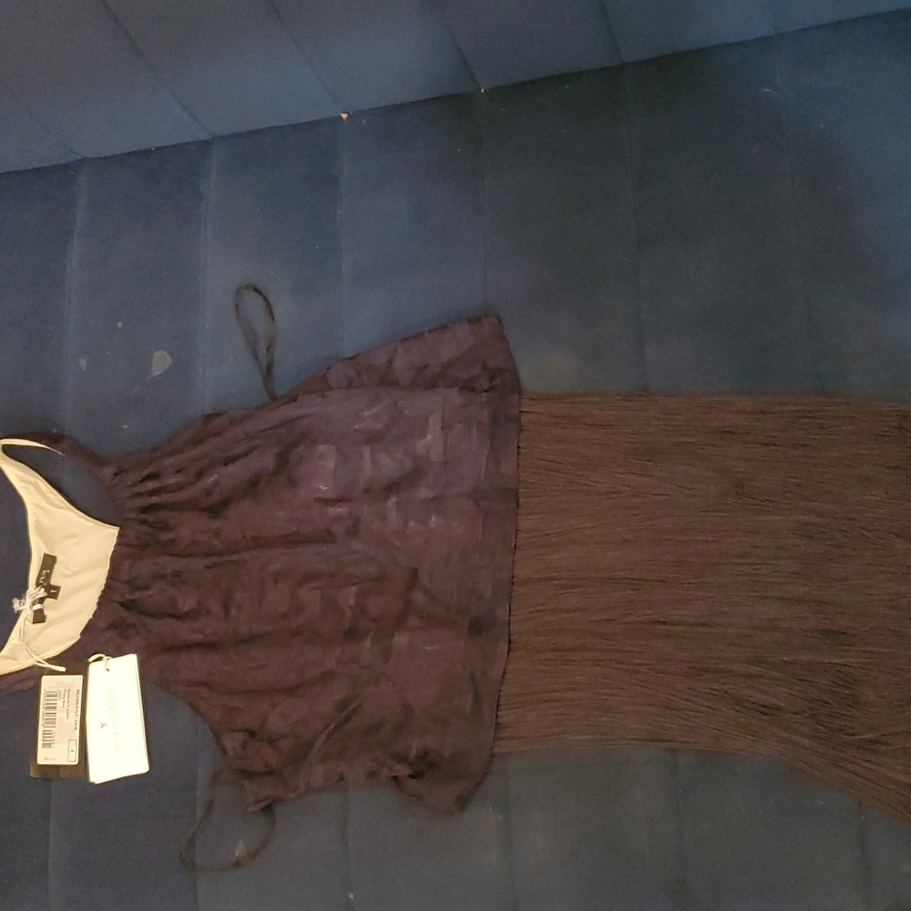Crop top with fringe.